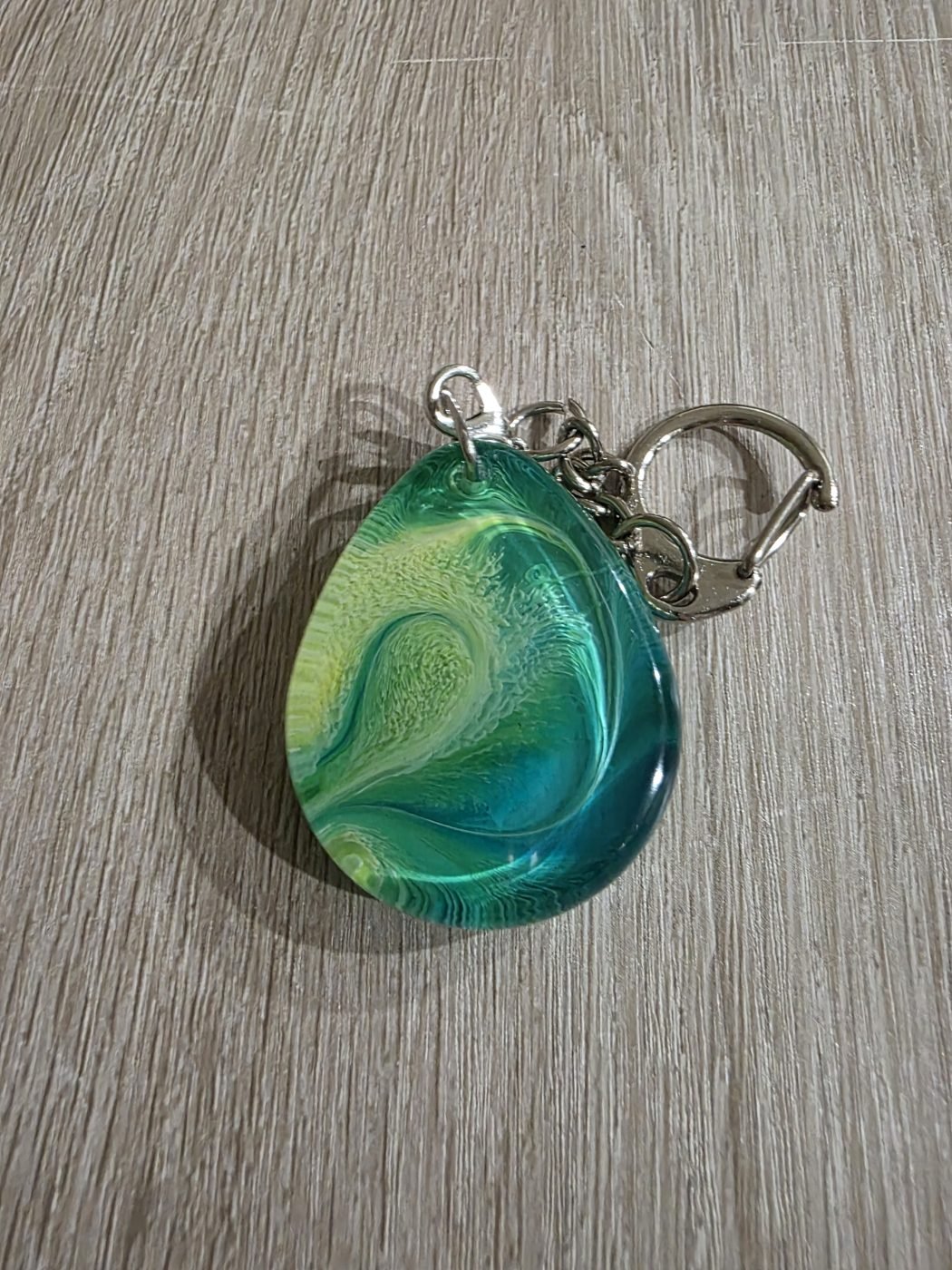 Aqua Lime Swirl Round Resin Keychain Aqua Lime Swirl Round Resin Keychain